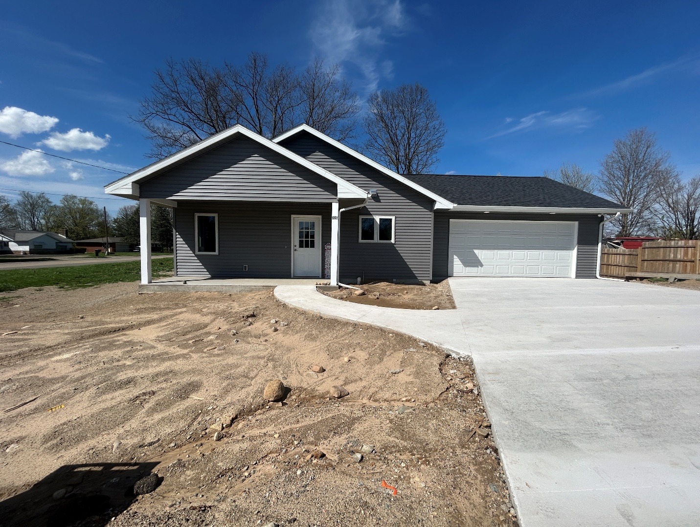 Finishing Touches: The Driveway is Finally Poured at House #45